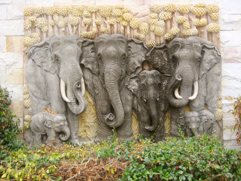 Low relief of herd of elephants royalty free stock images