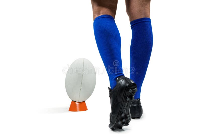 Low Section of Rugby Player about To Kick the Ball Stock Photo Image