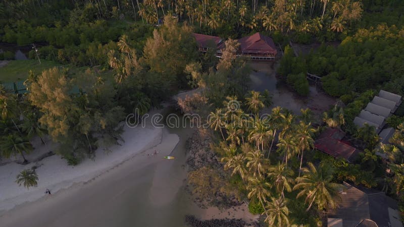 Low sun evening atmosphere golden hour. Smooth aerial top view flight drone