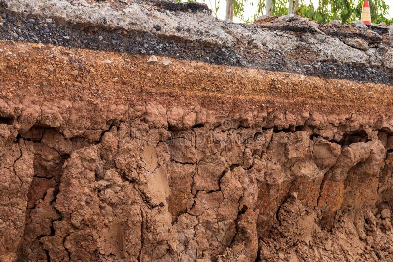 Soil under the road, which has been eroded in the countryside.