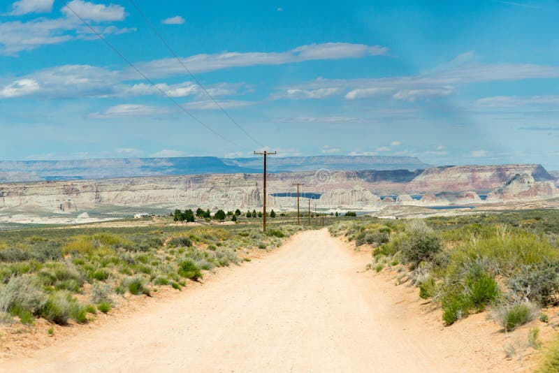Empty road crossing Bonneville Salt Flats