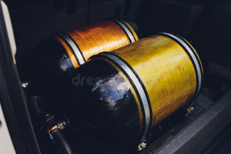 LPG , NGV Gas Tanks are Installed in a Car for the 2 Fuel System. Stock