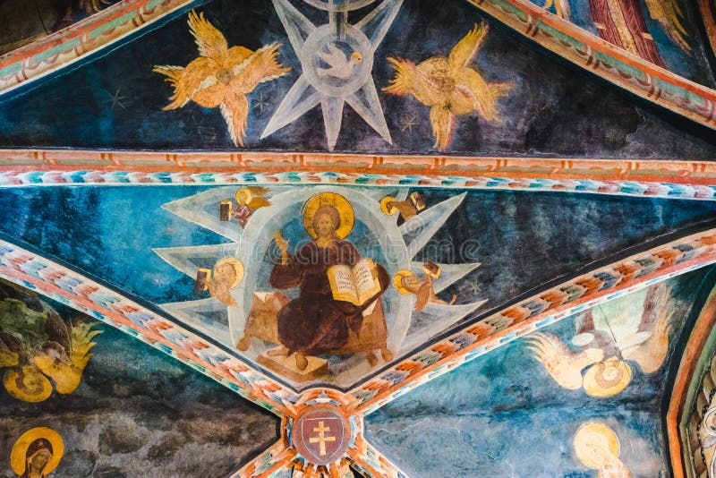 Ceiling frescoes - with Christ, angels and pigeon stock photography Ceiling frescoes - with Christ, angels and pigeon stock photography
