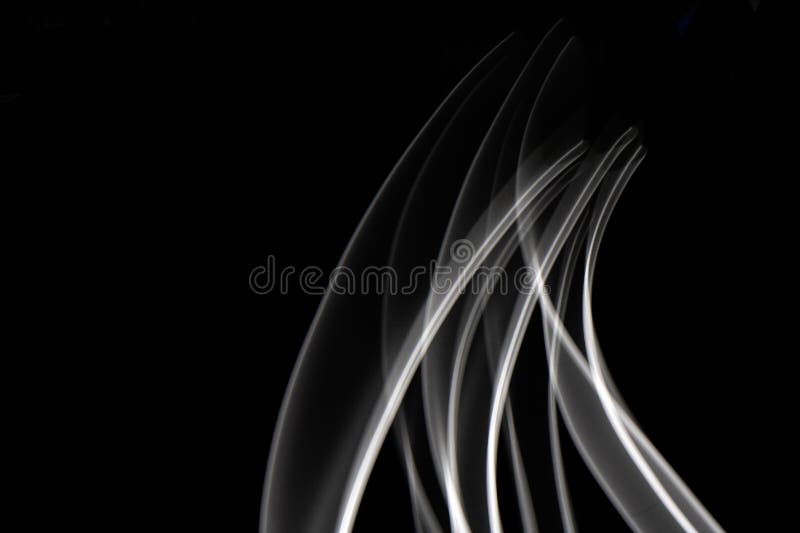 Luce in bianco e nero su fondo nero linee astratte oscillazioni e ondate fotografia stock