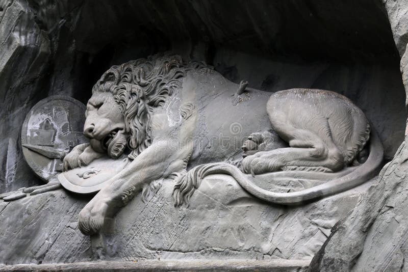 Stone statue depicting a lion in Lucerne Switzerland. Stone statue depicting a lion in Lucerne Switzerland