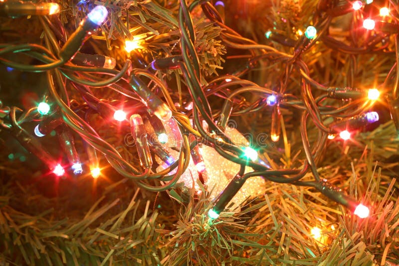 background with christmas lights and bright colors on the tree as decoration. background with christmas lights and bright colors on the tree as decoration