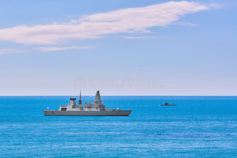 Air-defence Destroyer and Submarine in the Sea. Air-defence Destroyer and Submarine in the Sea