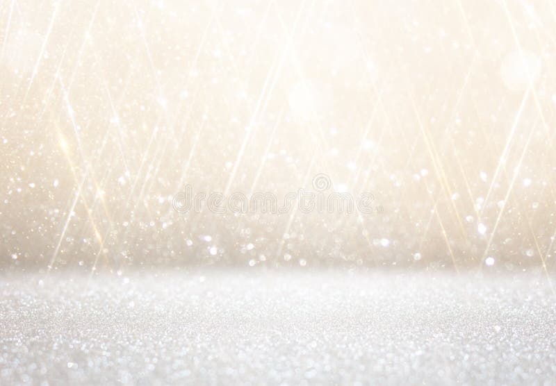 Luci astratte bianche e d'argento del bokeh Priorità bassa Defocused immagini stock