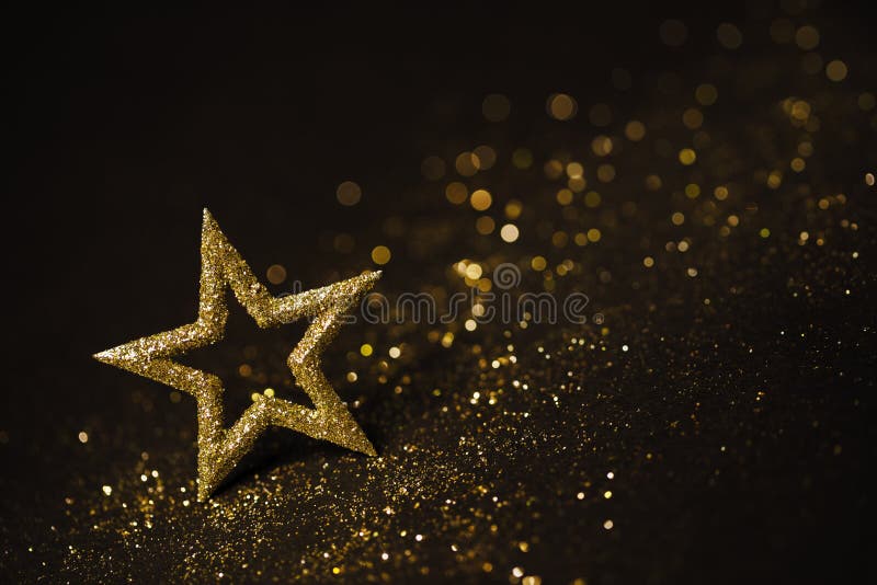 Luci astratte della decorazione della stella, scintille dell'oro, lustro vago immagini stock Luci astratte della decorazione della stella, scintille dell'oro, lustro vago immagini stock