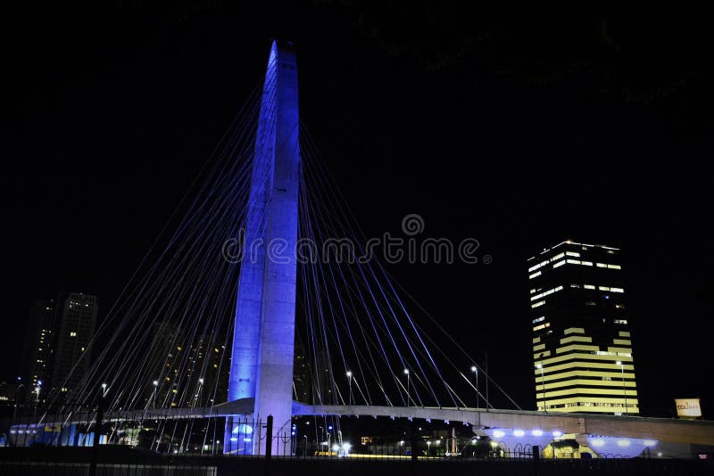 S�o Jos� dos Campos, April 5, 2024: The beautiful view of the lights of the Colinas Green Tower and the Juana Blanco Arch of Innovation cable-stayed bridge. S�o Jos� dos Campos, April 5, 2024: The beautiful view of the lights of the Colinas Green Tower and the Juana Blanco Arch of Innovation cable-stayed bridge