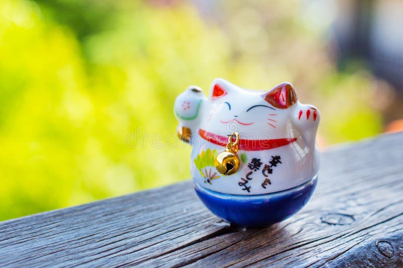 Lucky Cat in blue color stock photo. Image of golden 74411862