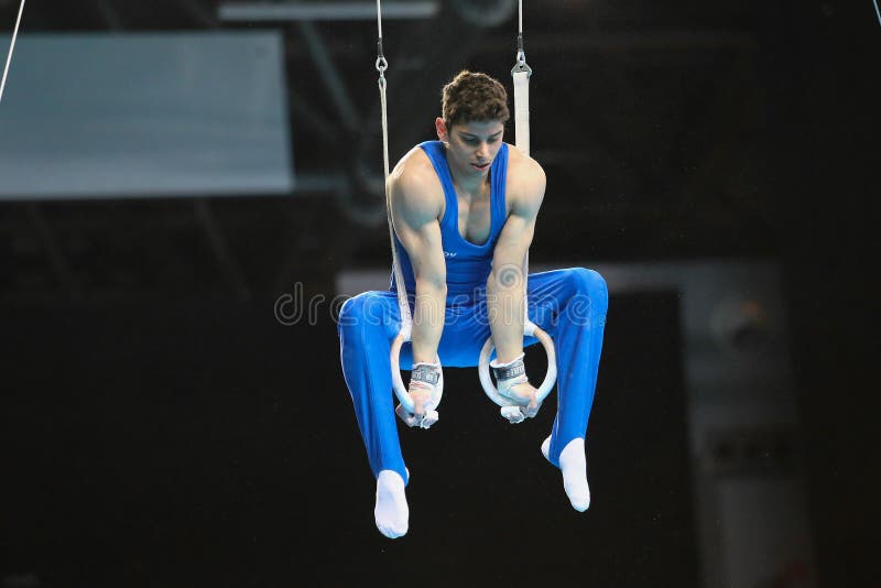 Szczecin, Poland, April 10, 2019:	Ludovico Edalli of Italy competes on the rings during the European artistic gymnastics championships. Szczecin, Poland, April 10, 2019:	Ludovico Edalli of Italy competes on the rings during the European artistic gymnastics championships