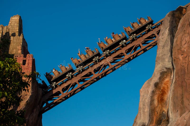 Orlando, Florida. April  29, 2019 People enjoying Expedition Everest rollercoaster at Animal Kingdom 1. Orlando, Florida. April  29, 2019 People enjoying Expedition Everest rollercoaster at Animal Kingdom 1