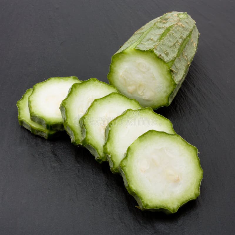 Raw Luffa Squash or Touria used in asian cooking or dried out to scrub your back.