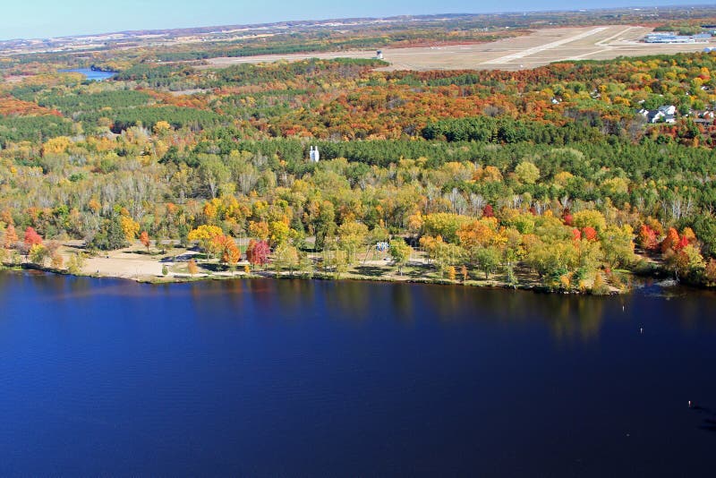 An fall aerial of the Chippewa River in Eau Claire Wisconsin with Riverview Park and the Chippewa Valley Regional airport. An fall aerial of the Chippewa River in Eau Claire Wisconsin with Riverview Park and the Chippewa Valley Regional airport.