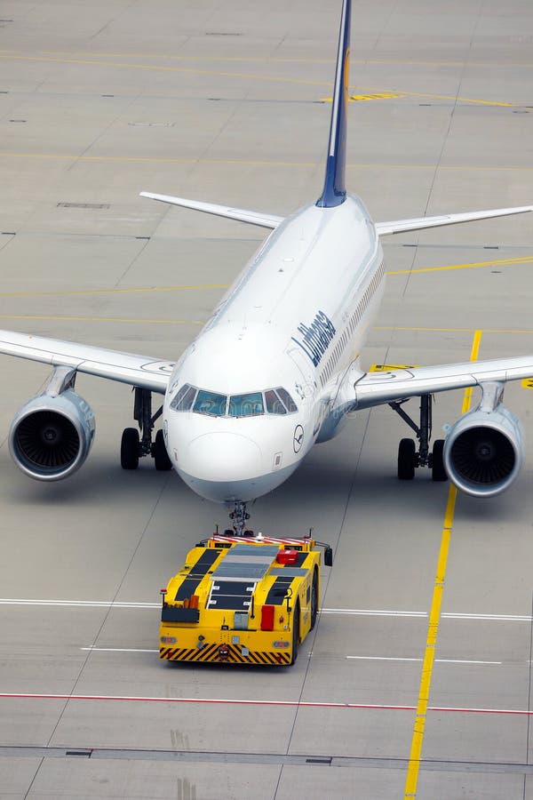Lufthansa plane being towed stock photo