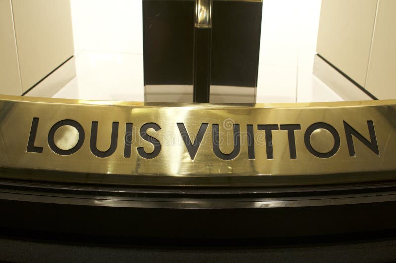 Vertical Shot Of A Louis Vuitton Banner On A Building At Night In Singapore  Stock Photo - Download Image Now - iStock
