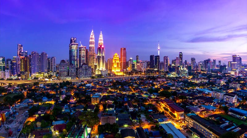 Lugar de Kuala Lumpur Cityscape Landmark Travel do dia de Malásia 4K ao lapso da noite