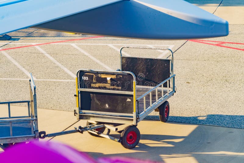 Luggage Cart at Airplane on Runway of the Airport Stock Image Image