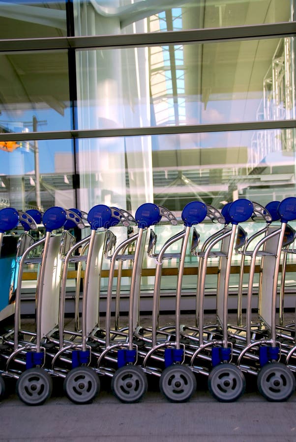 Luggage carts airport stock image. Image of perspective 1269679