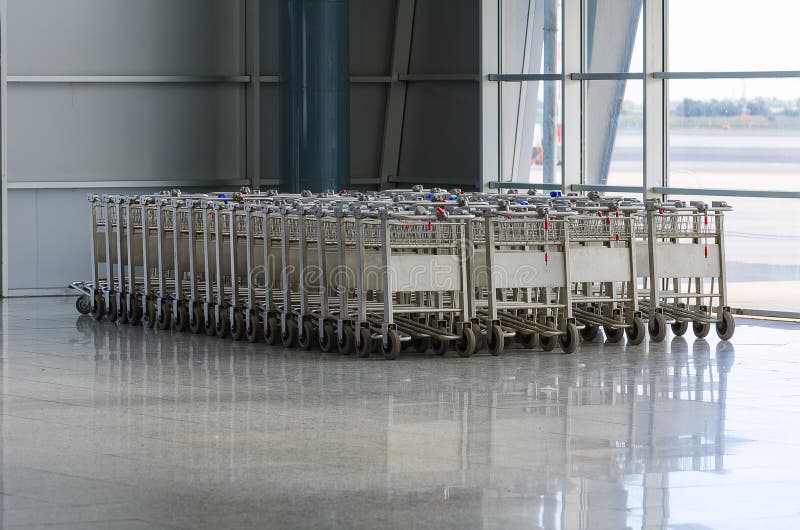 Luggage trolleys stock image. Image of inside, plane 34863243