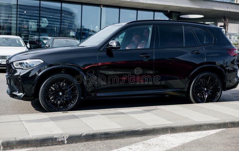 Minsk, Belarus, May 3, 2024 - Luxury crossover BMW on parking lot. Minsk, Belarus, May 3, 2024 - Luxury crossover BMW on parking lot