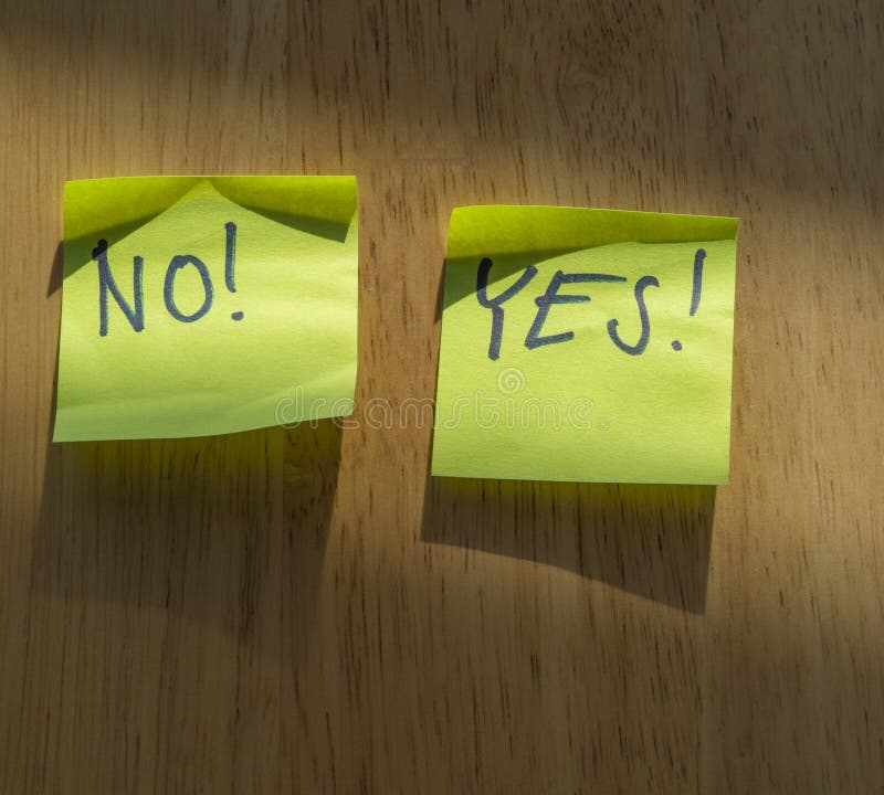 Luminous green stick on label - note yes and no stock photography