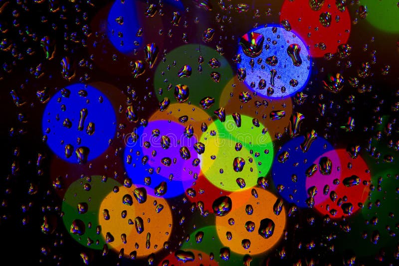 Lumières de pluie et de Noël photos stock Lumières de pluie et de Noël photos stock