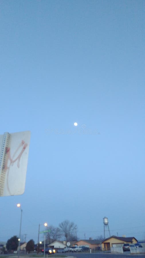 Luna moon dusk blue sky royalty free stock photo