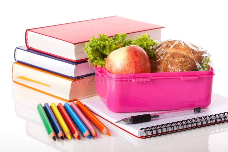 Lunch box and books on the white background. Crispy diet stock images, royalty-free photos and pictures