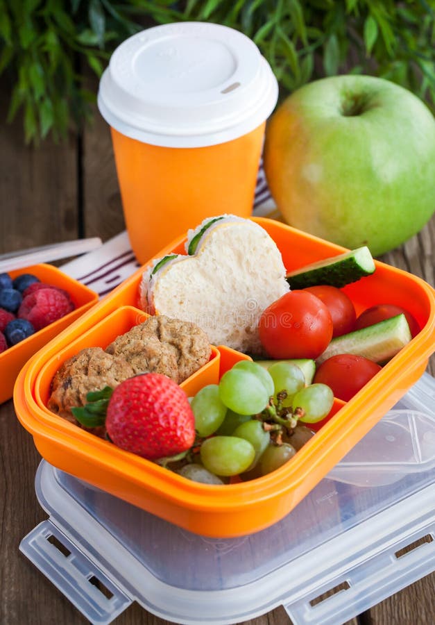 Lunch Box with Sandwich, Cookies, Veggies and Fruits Stock Photo ...