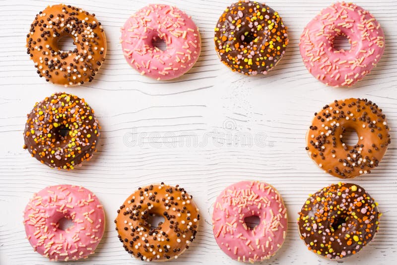 Lunch with donuts frame on white table background top view mock up royalty free stock photos Lunch with donuts frame on white table background top view mock up royalty free stock photos