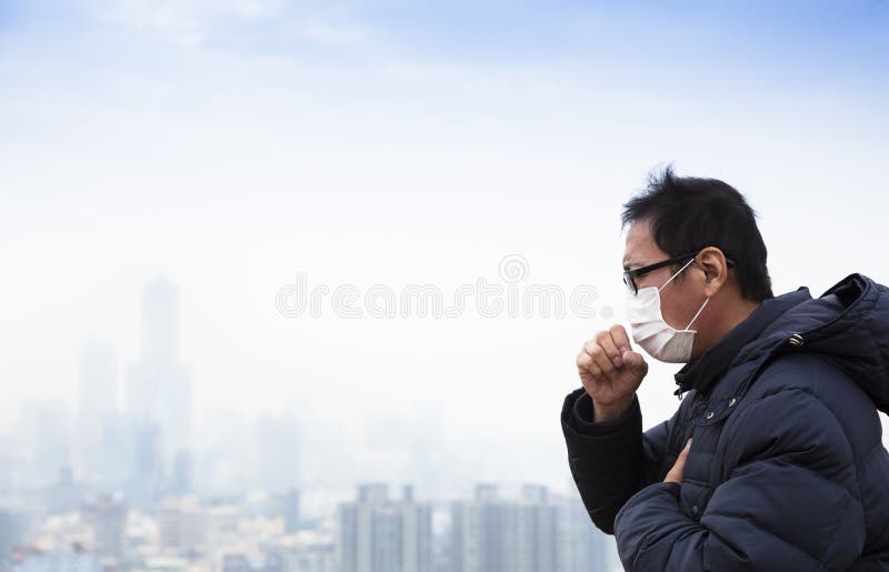 Lung cancer patients with smog city stock images