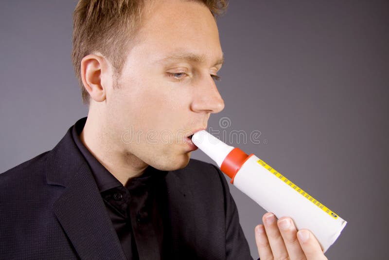 Lung testing with a Peak flow meter stock photography