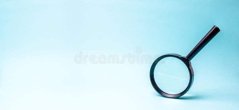 Magnifying glass on blue background. search and analysis, analytics and study of details. Validation, identification of fakes and crimes, review and study of the world. banner. Magnifying glass on blue background. search and analysis, analytics and study of details. Validation, identification of fakes and crimes, review and study of the world. banner
