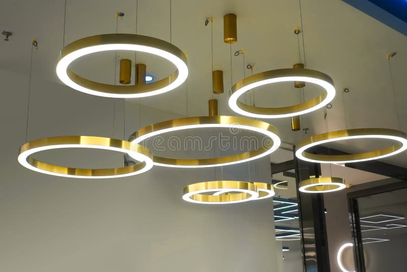 Modern circular led lighting chandelier in modern commercial building. Modern circular led lighting chandelier in modern commercial building