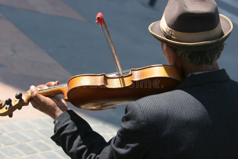 Gipsy who play violin on the street. Gipsy who play violin on the street