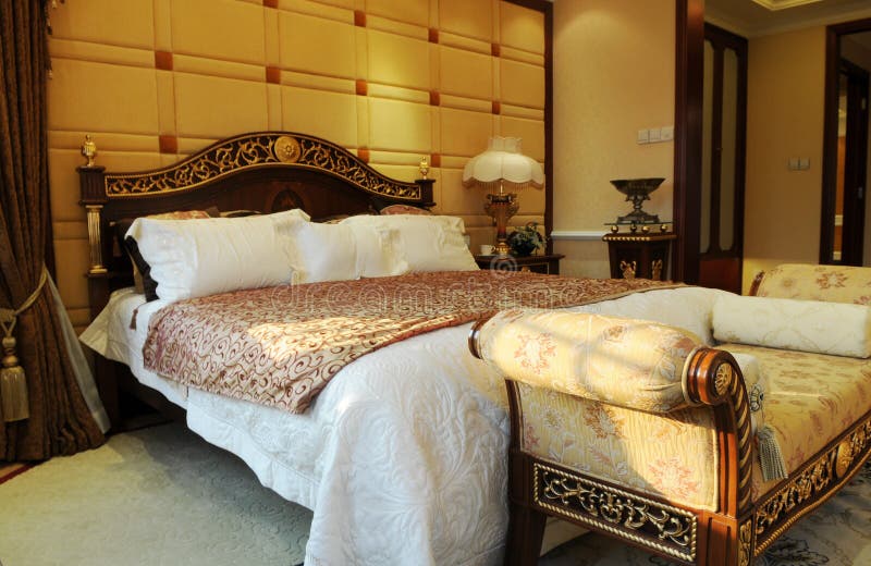 The luxury family bedroom with classical style furniture,king size bed. The luxury family bedroom with classical style furniture,king size bed.