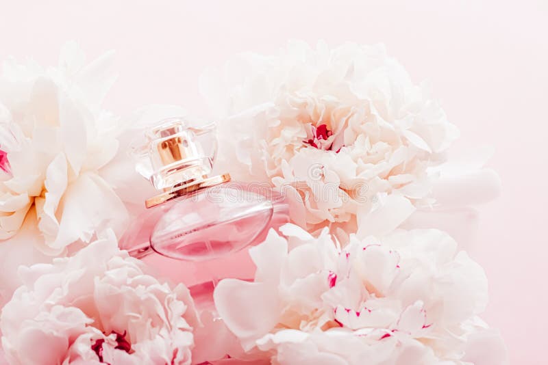 Violet Fragrance Bottle As Luxury Perfume Product On Background Of Peony  Flowers, Parfum Ad And Beauty Branding Design Stock Photo, Picture and  Royalty Free Image. Image 149590294.