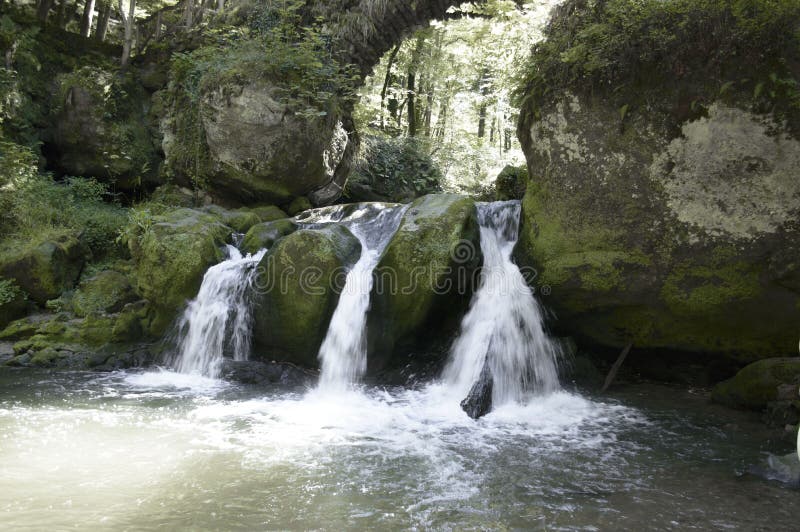 Luxembourg waterfall in the heart of the country, three waterfalls, endless flow of water, falling water, waterfall