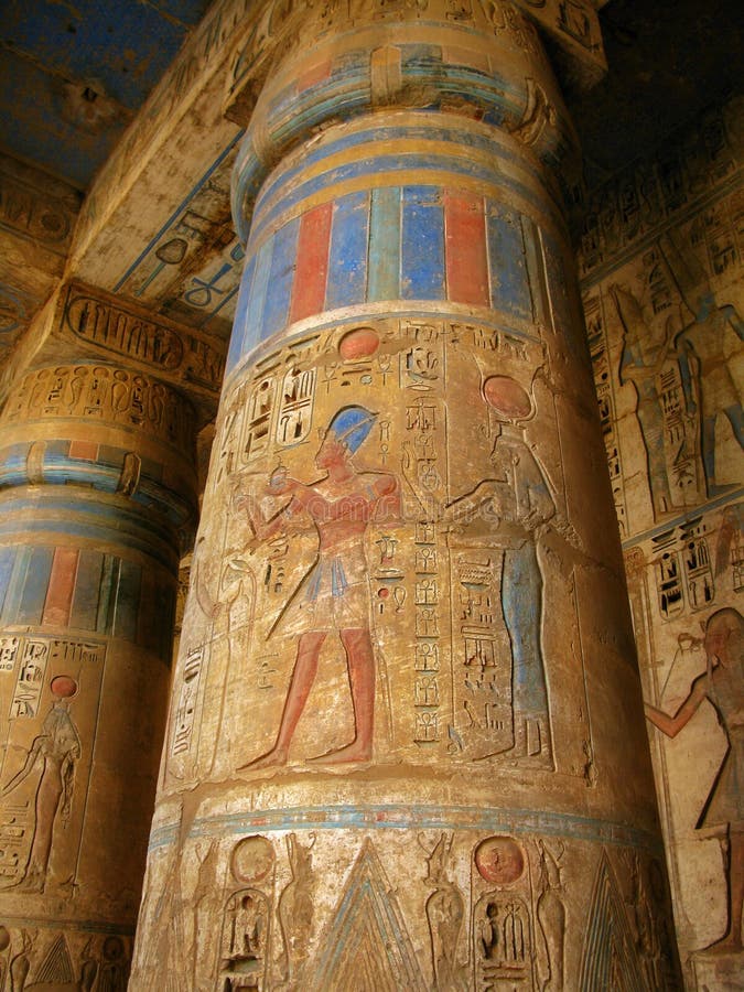 Luxor: columns with pharaoh carvings, Medinet Habu