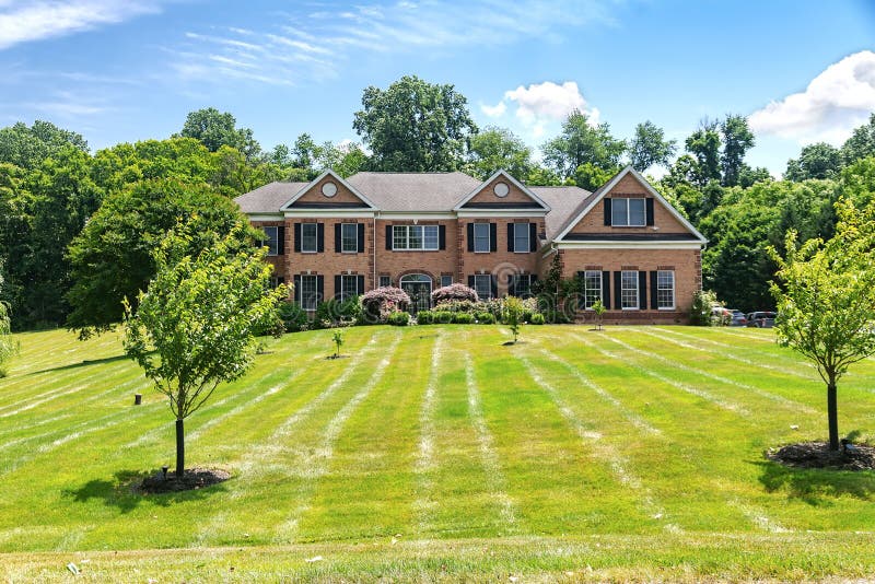 Luxurious Brick House in Suburb. Beautiful House with a Large Lawn