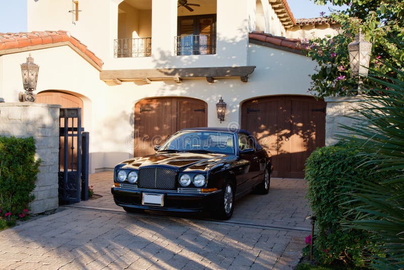 Luxurious Car Parked In Entrance Gate Of House Royalty Free Stock