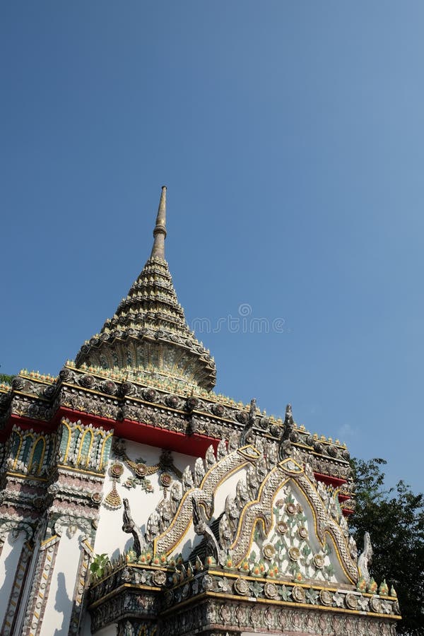 Luxurious decoration of the roof and spire of a Buddhist temple stock photos Luxurious decoration of the roof and spire of a Buddhist temple stock photos