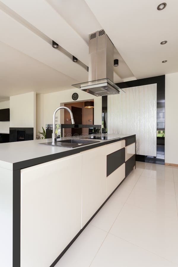 Luxurious kitchen in modern flat royalty free stock photography