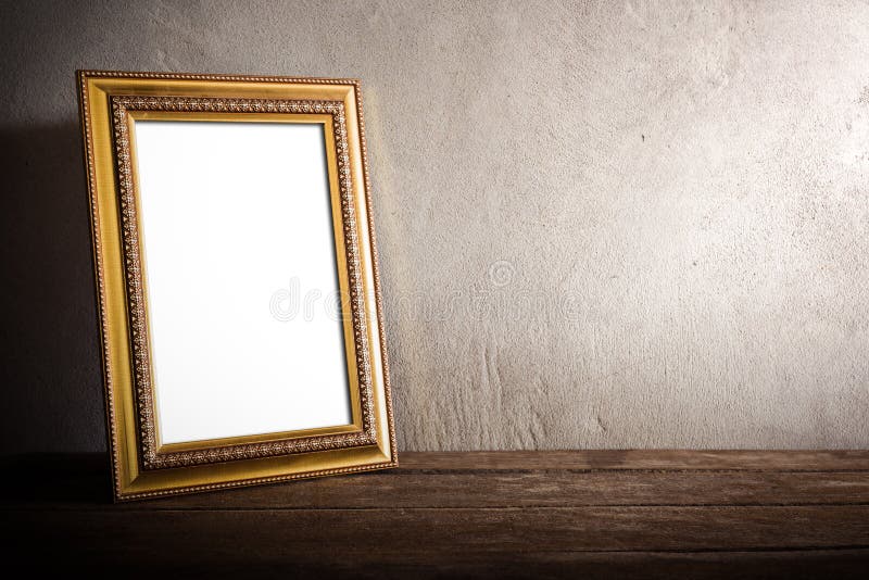 Luxurious photo frame on wooden table over grunge background royalty free stock photos Luxurious photo frame on wooden table over grunge background royalty free stock photos