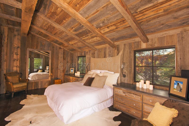 Luxurious Rustic Log Cabin Bedroom Stock Photo - Image of 