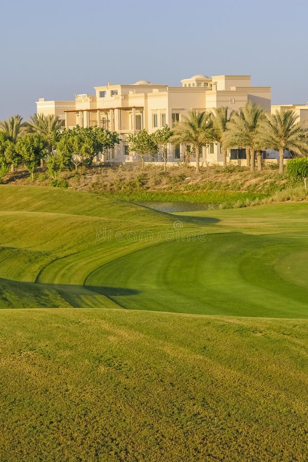 A luxurious villa overlooking the golf course at Emirates Hills in Dubai, United Arab Emirates. A luxurious villa overlooking the golf course at Emirates Hills in Dubai, United Arab Emirates