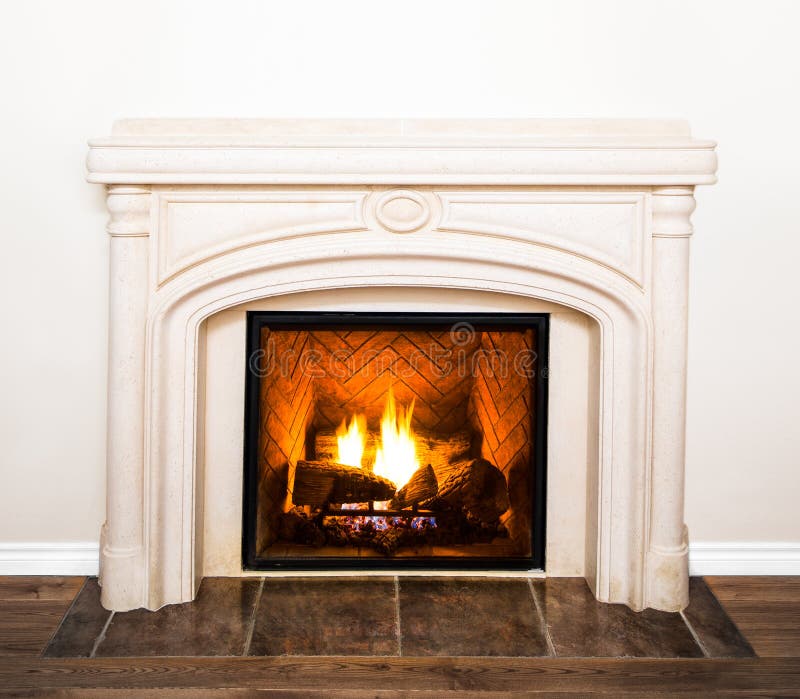Luxurious White Marble Fireplace and empty wall stock photos