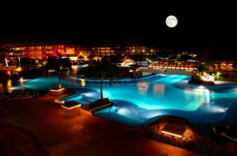 A luxury all inclusive beach resort at night